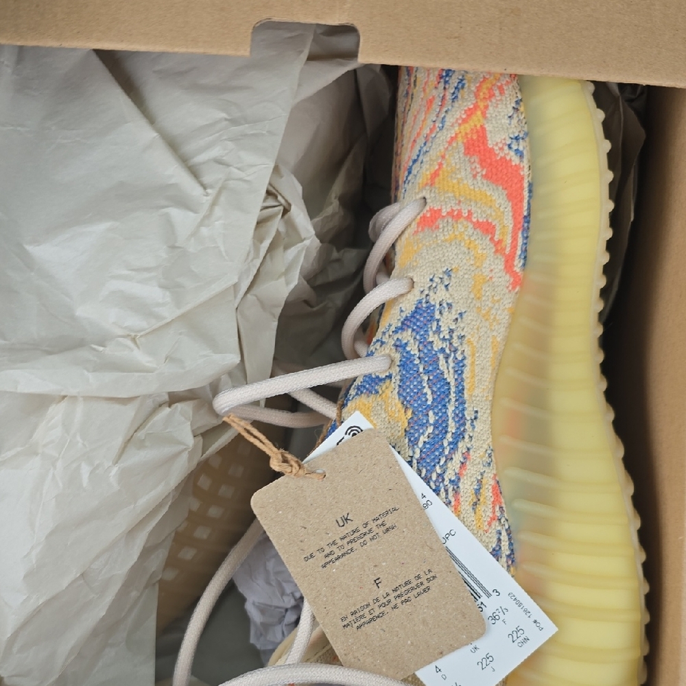 Yeezy Blue and Orange Sneakers with Organic Patterns
